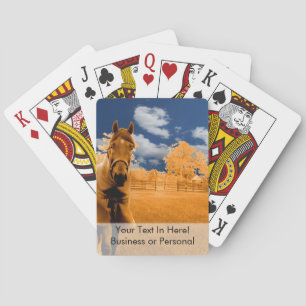 surreal horse walking fence orange blue sky playing cards