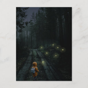 Surreal nighttime scene of boy in a forest postcard