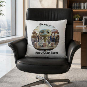 Surviving earth alien coffee drinker cushion