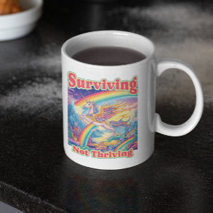 Surviving Not Thriving – Rainbow Unicorn Mug