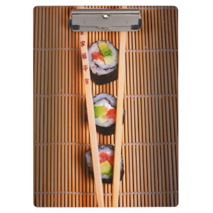 Sushi and wooden chopsticks clipboard