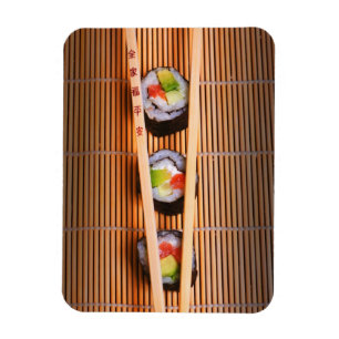 Sushi and wooden chopsticks magnet