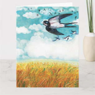 Swallows flying over a wheat field   card