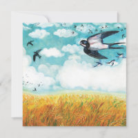 Swallows flying over a wheat field