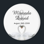 Swan couple names monogram wedding magnet<br><div class="desc">Two beautiful swans in love on a lake bending their heads toghether and forming a heart. White elegant background.  Template for your names and date. Black letters. 
A swan couple stay together for life,  so they are the perfect symbol of love.</div>