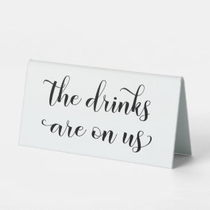 Swash Font Calligraphy Drinks Are On Us Bar Sign