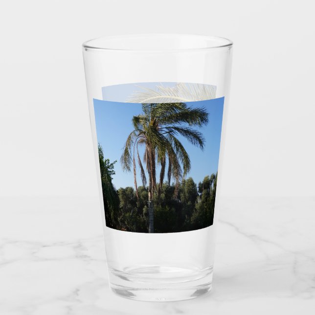 Swaying Palm Tree Under a Clear Sky Glass (Front)