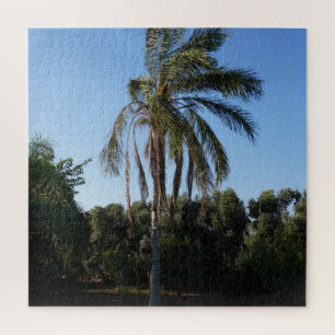 Swaying Palm Tree Under a Clear Sky Jigsaw Puzzle