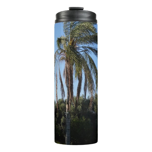 Swaying Palm Tree Under a Clear Sky Thermal Tumbler (Front)