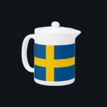 Swedish Flag Teapot<br><div class="desc">Elevate your tea experience with our elegant teapot featuring the flag of Sweden! This beautiful teapot is not just a functional item; it’s a celebration of Swedish culture and pride. The vibrant design prominently displays the iconic Swedish flag, making this teapot a unique and stylish way to enjoy your favourite...</div>