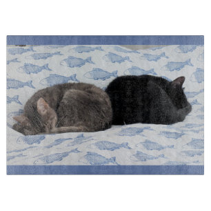 Sweet Feline Dreams Among Blue Fish Cutting Board