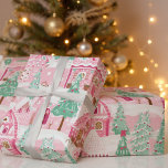 Sweet Pastel Pink Gingerbread Village Christmas Wrapping Paper<br><div class="desc">Celebrate the sweetness of the festive season with our Pastel Pink Christmas Gingerbread Houses Wrapping Paper. This delightful design showcases intricately detailed gingerbread houses in soft pink tones, evoking memories of holiday baking and joyous celebrations. Ideal for wrapping gifts with a touch of whimsical charm, this paper is sure to...</div>