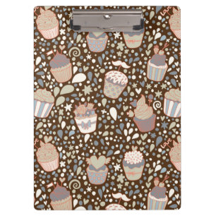 Sweet pattern made of tasty cupcakes clipboard