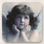 Sweet Rosy Cheeked Vintage Angel in Clouds Coaster<br><div class="desc">Beautiful vintage design of a sweet angel with soft white wings and rosy cheeks,  holding her face in her hands. Looking peaceful and kind. The background is filled with soft ethereal clouds.</div>