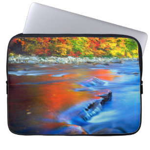 Swift River reflecting autumn colours Laptop Sleeve