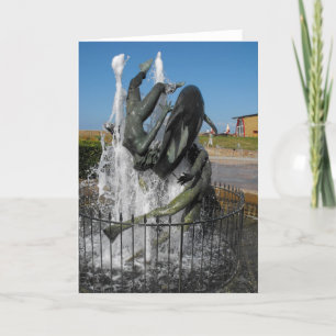 Swimming with dolphins fountain holiday card