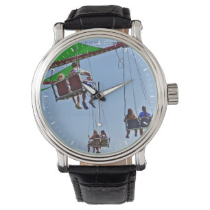 Swing Ride Next to Ferris Wheel Watch