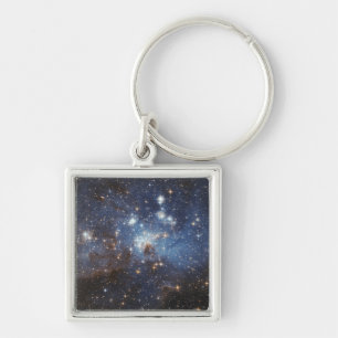 Swirls of gas and dust key ring