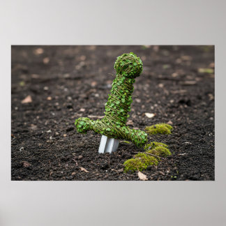Sword in the ground covered in leaves poster
