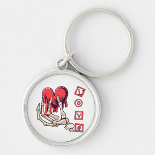 Symbolic Love Skeleton Hand Offering Heart Key Ring