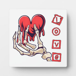Symbolic Love Skeleton Hand Offering Heart Plaque