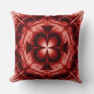 Symmetric flowery red ornament cushion