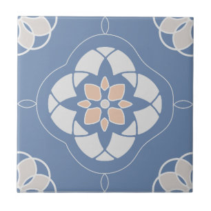 Symmetric Orange Flower Tiled Pattern on Blue Ceramic Tile