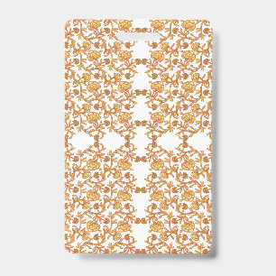 Symmetrical floral pattern with orange motifs rese ID badge