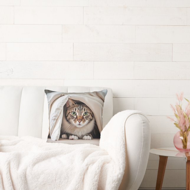 Tabby Cat Hiding Under a Blanket Cushion (Couch)