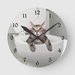 Tabby cat in toilet round clock