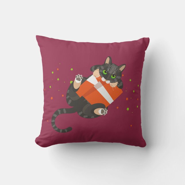 Tabby cat on bed with blanket / playing with card cushion (Front)