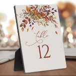 Table Number Fall Watercolor Wedding Easel Plaque<br><div class="desc">Add a touch of whimsy to your wedding with this enchanting table number plaque adorned with delicate fall watercolor. The dreamy design effortlessly sets a magical atmosphere for your special day, creating an unforgettable experience for both you and your guests. Each table number sign comes with a complementary easel, ensuring...</div>