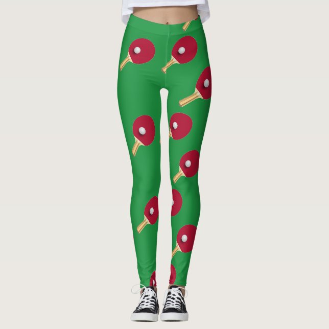 Table tennis racket and ball on green leggings (Front)