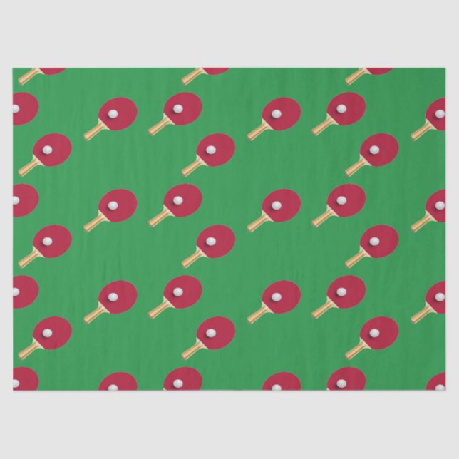 Table tennis racket and ball on green tissue paper (Front)