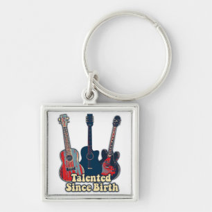 Talented since birth. retro colourful guitars key ring
