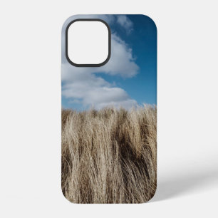 Tall grass under cumulus clouds iPhone 12 case