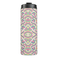 Tall, insulated travel mug with intricate