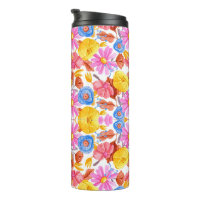 Tall travel mug featuring a vibrant floral pattern