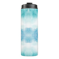Tall travel mug with a black lid