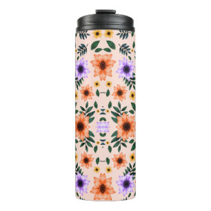 Tall travel mug with a floral pattern