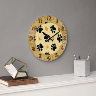 Tan and black paw print on a gold background #3 large clock