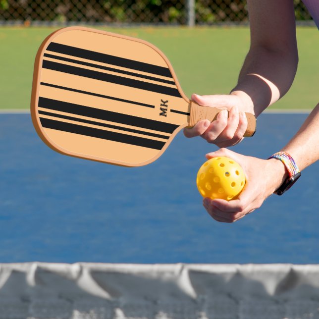 Tan and black stripes monogram pickleball paddle (Insitu)