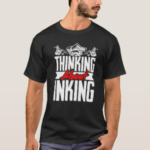 Tattoo Artist Thinking About Inking   T-Shirt