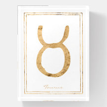 Taurus hammered gold stylised astrology symbol 