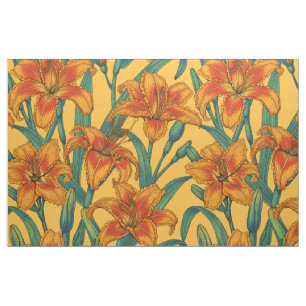 Tawny daylily flowers, blue and yellow fabric