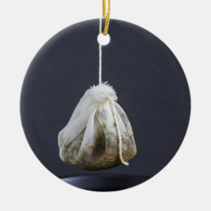 Tea bag is hung in a cup ceramic tree decoration