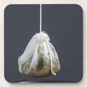 Tea bag is hung in a cup coaster
