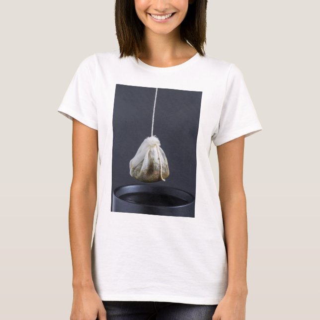 Tea bag is hung in a cup T-Shirt (Front)