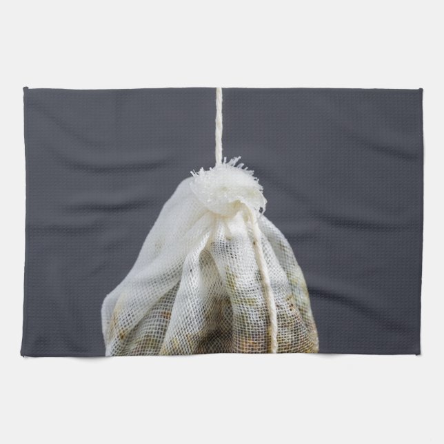 Tea bag is hung in a cup towel (Horizontal)