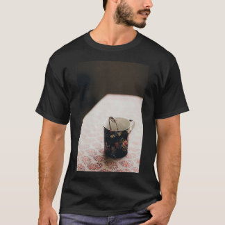 Tea cup on a table T-Shirt